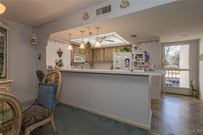 Relax and enjoy convenient living in this 2nd floor corner end - photo 16