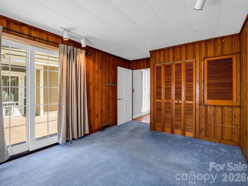 Discover unparalleled single-level living and privacy in the - photo 31