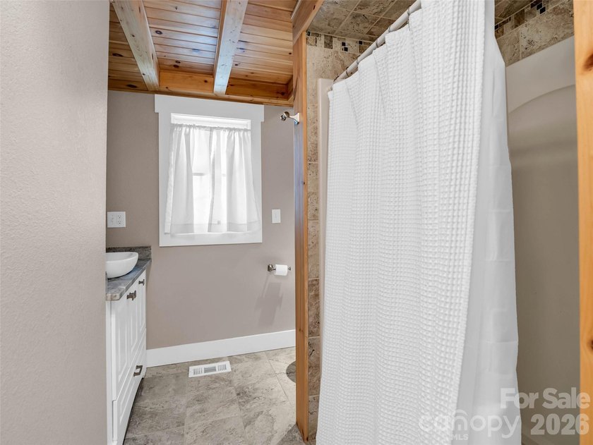 Discover unparalleled single-level living and privacy in the - photo 34