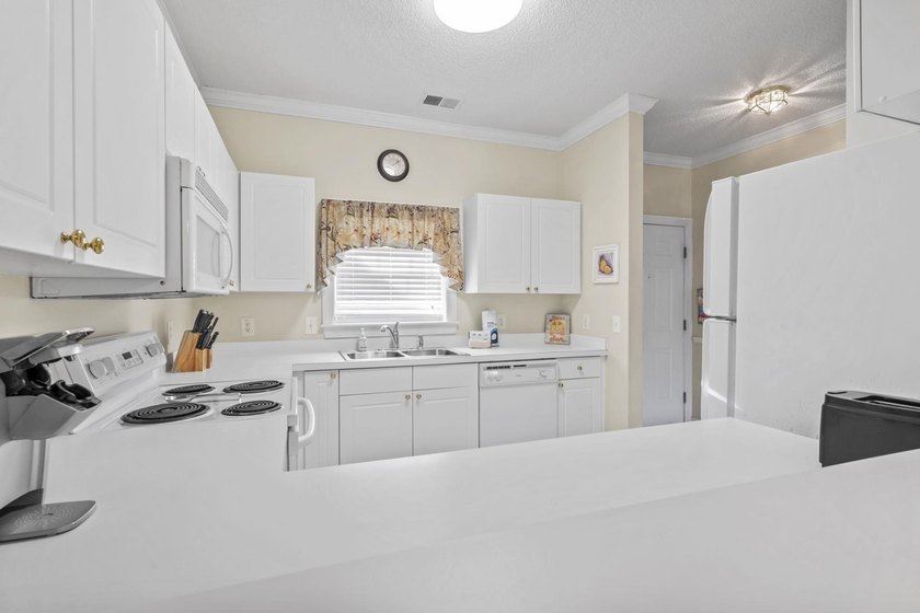 Welcome to 5750 Oyster Catcher Drive, Unit 434, located in the - photo 7