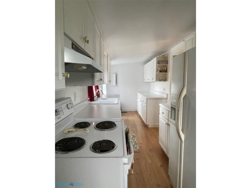 Charming, bright cottage home located on historic *Cottage Row* - photo 13