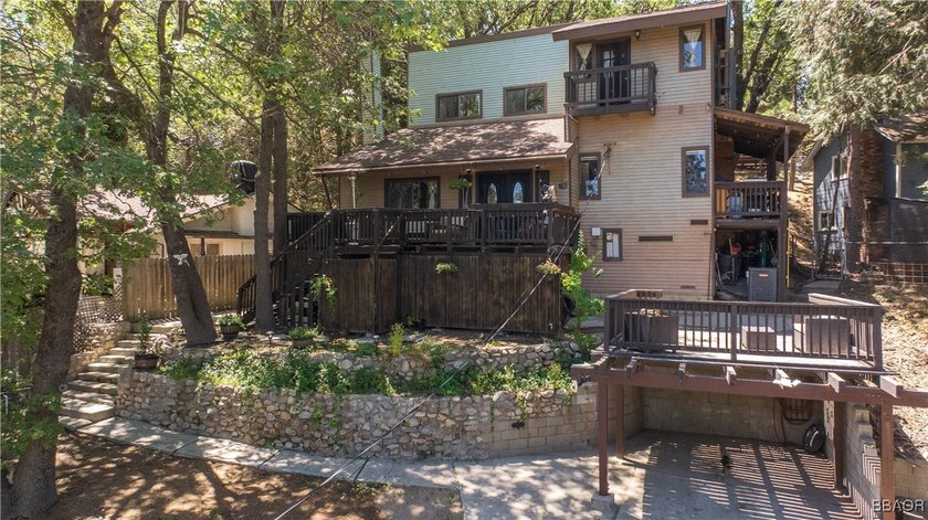 Tucked away in the peaceful pines of Crestline, this charming - photo 3