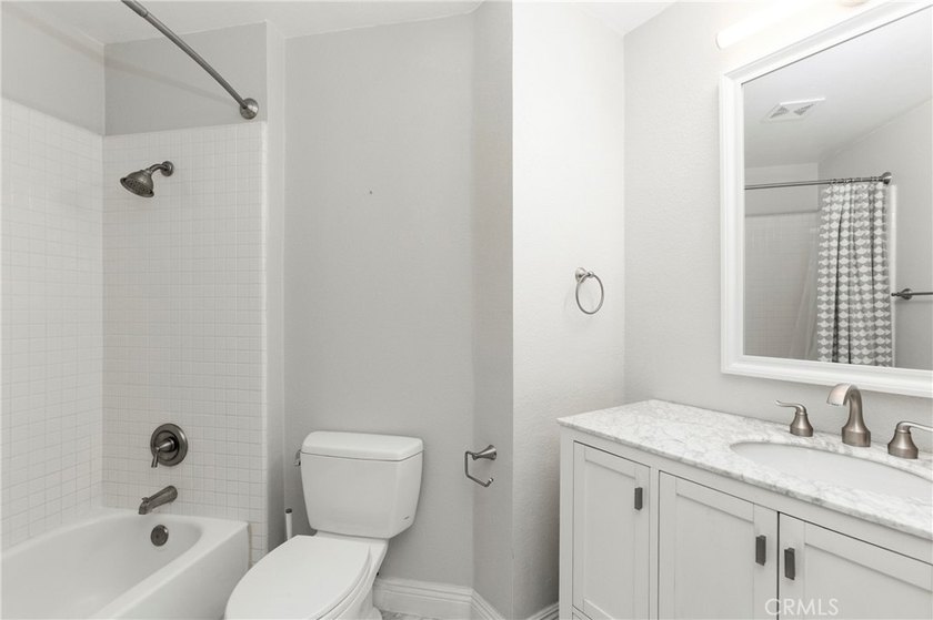 Rarely available end-unit 3-bedroom, 3 full-bath home in the - photo 20