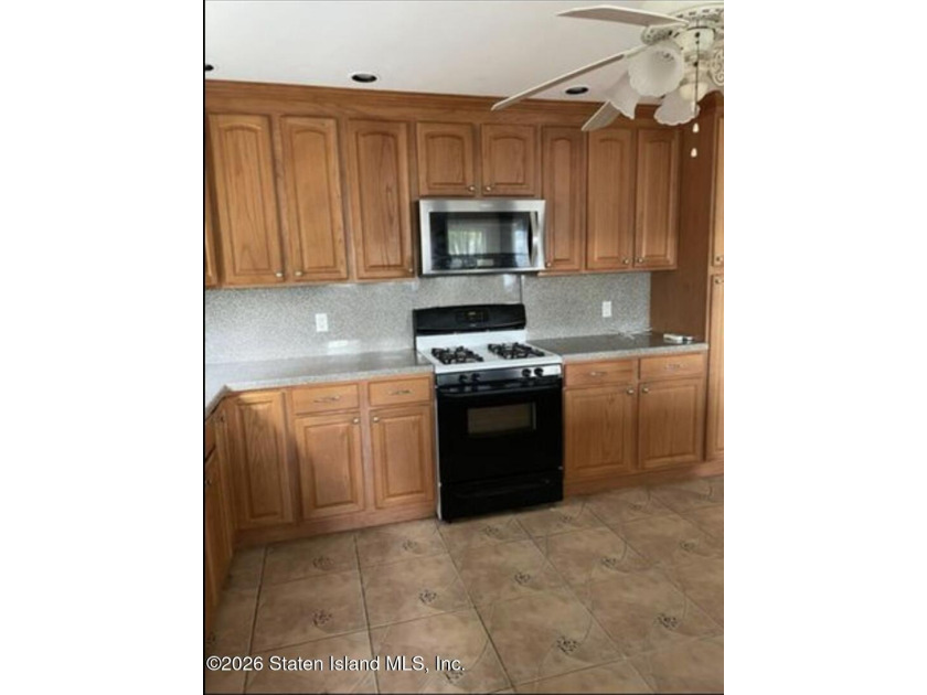 Spacious two-family high ranch situated on an oversized corner - photo 10