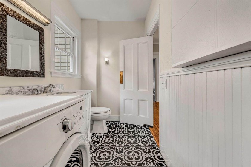 Set gracefully on 1.55 acres and positioned back from the road - photo 39