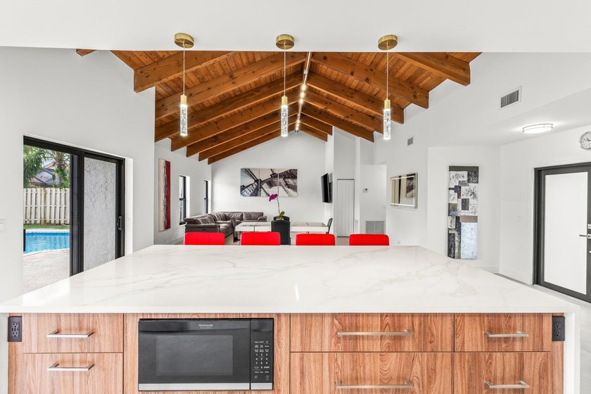 Stunning Modern Home with Heated Pool! Situated in desirable - photo 9