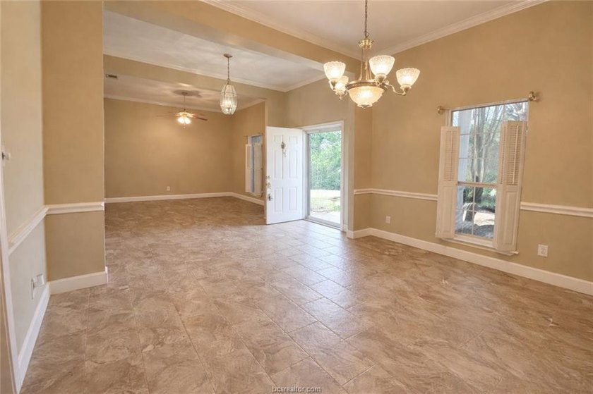 Situated on nearly three-quarters of an acre beneath mature - photo 5