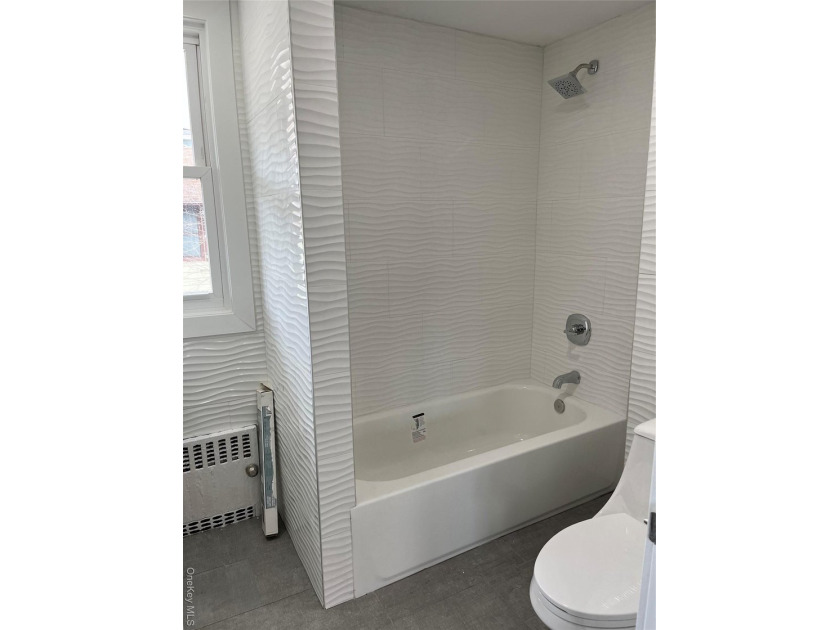 Welcome to this income-producing residential property in the - photo 29
