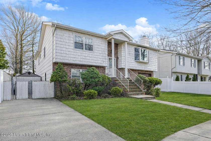 Discover 72 Reading Avenue-a two family Broadside Ranch tucked - photo 2