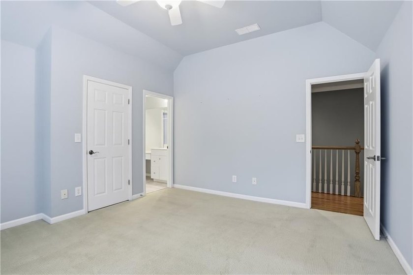 Nestled behind a sweeping lawn on a private, tree-lined lot - photo 30