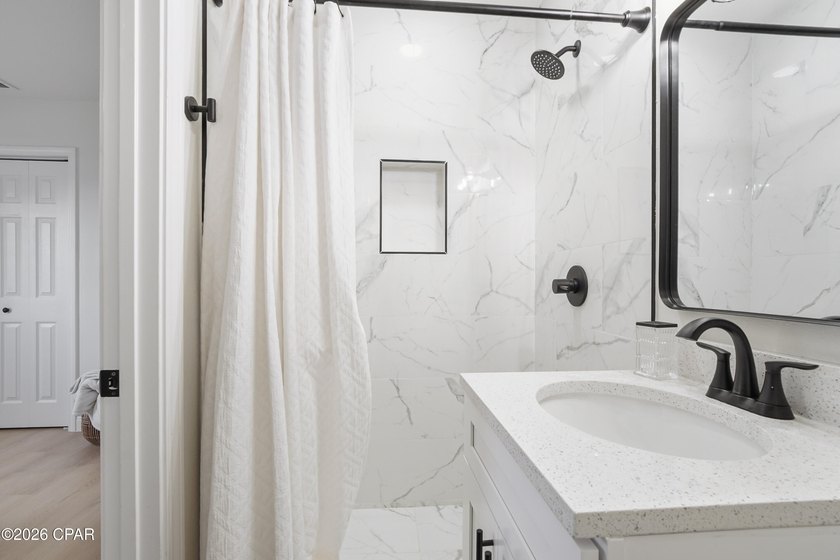 Fully renovated and thoughtfully designed, this rare 5-bedroom - photo 22