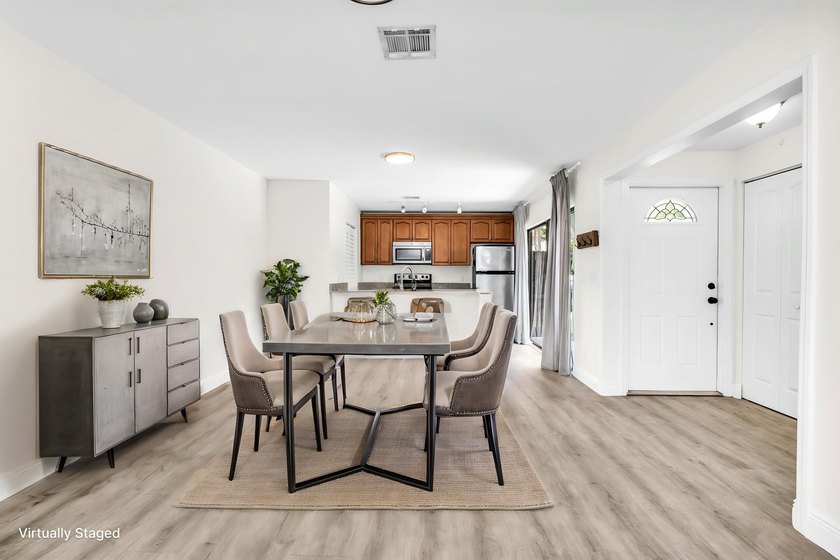 Beautifully updated two-story townhouse located in the highly - photo 12