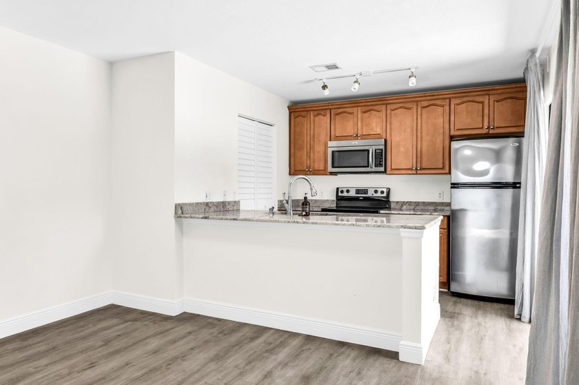 Beautifully updated two-story townhouse located in the highly - photo 14
