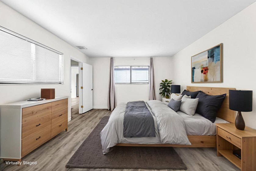 Beautifully updated two-story townhouse located in the highly - photo 31
