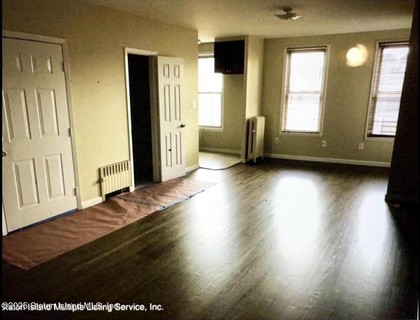 Discover this Large Fabulous Impeccable, 3 Family Home. This - photo 3
