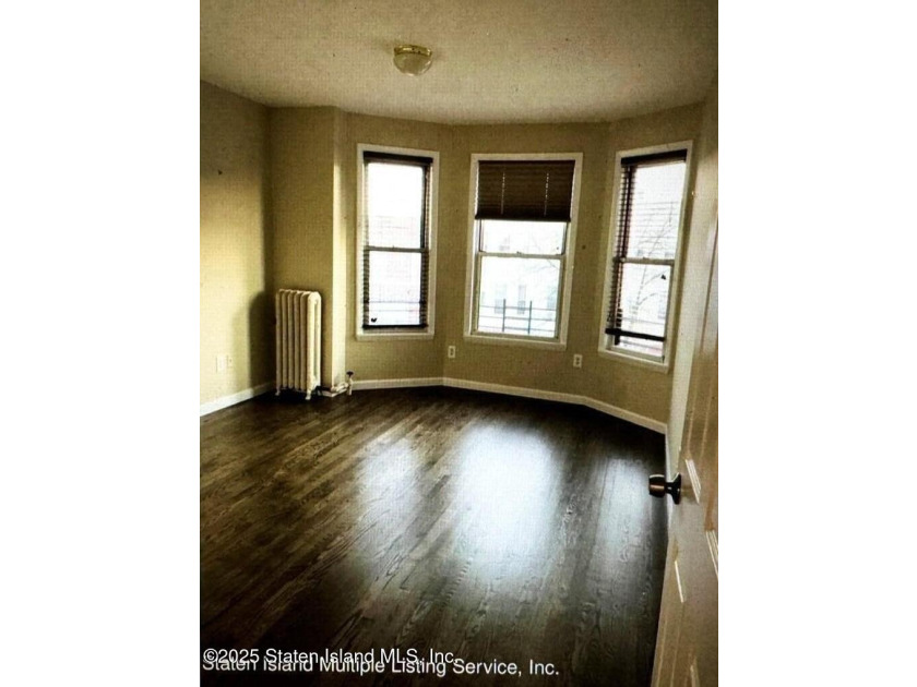 Discover this Large Fabulous Impeccable, 3 Family Home. This - photo 4