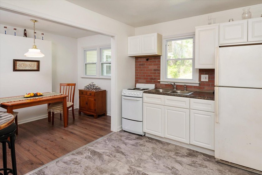 Move-in ready rambler with 4 bedrooms and 2.5 baths. The home - photo 8
