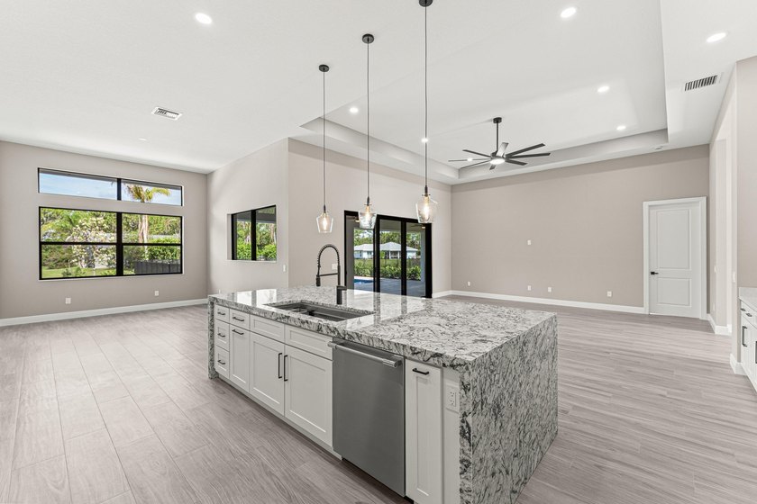 Welcome to 16631 132nd Terrace North, a newly completed custom - photo 13