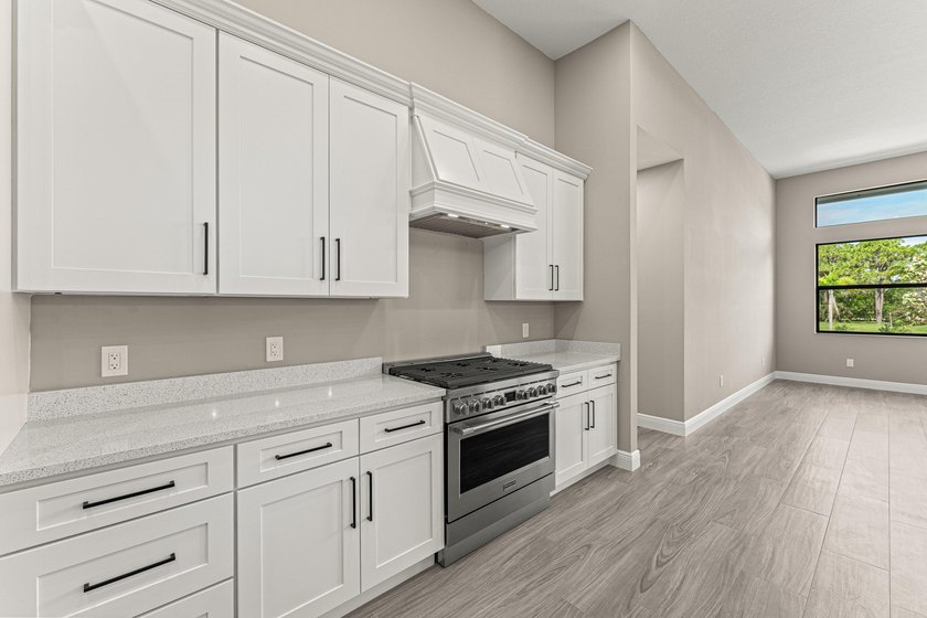 Welcome to 16631 132nd Terrace North, a newly completed custom - photo 14