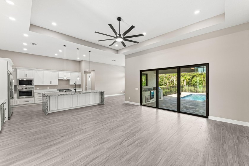 Welcome to 16631 132nd Terrace North, a newly completed custom - photo 15