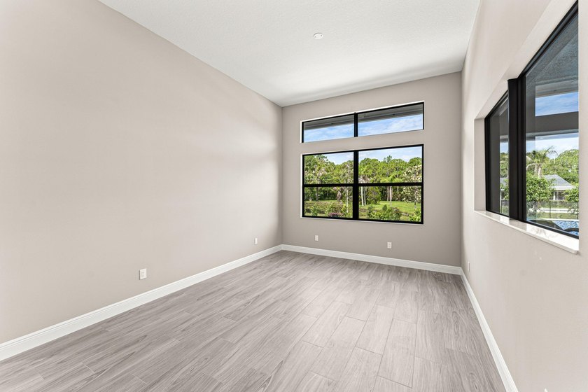 Welcome to 16631 132nd Terrace North, a newly completed custom - photo 16