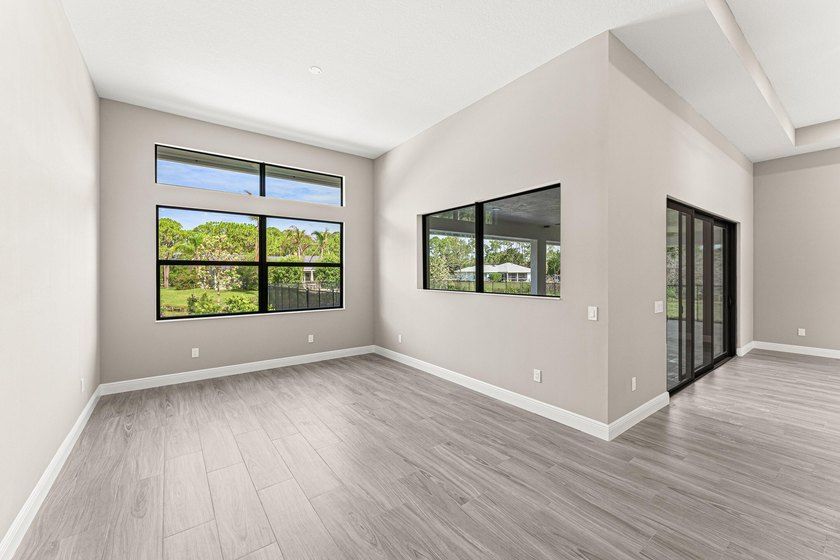 Welcome to 16631 132nd Terrace North, a newly completed custom - photo 20