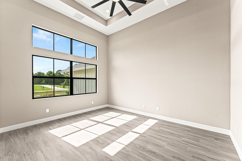 Welcome to 16631 132nd Terrace North, a newly completed custom - photo 24