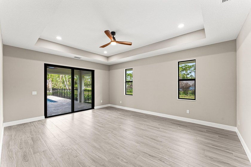Welcome to 16631 132nd Terrace North, a newly completed custom - photo 25