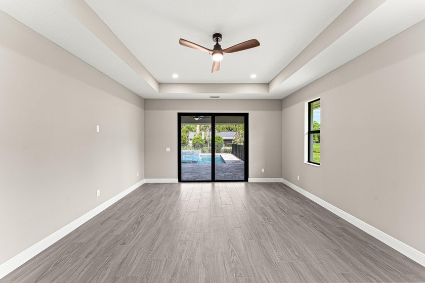 Welcome to 16631 132nd Terrace North, a newly completed custom - photo 30