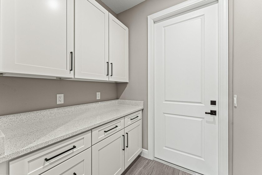 Welcome to 16631 132nd Terrace North, a newly completed custom - photo 38