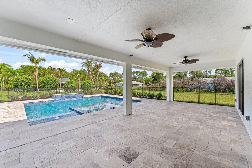 Welcome to 16631 132nd Terrace North, a newly completed custom - photo 40