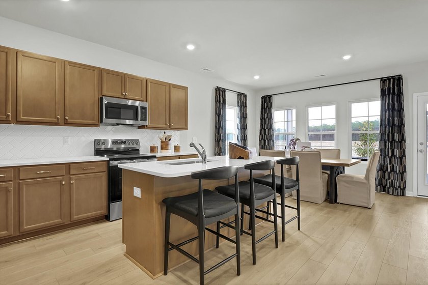 Live the golfing lifestyle at Fairway Woods in our brand-new - photo 6