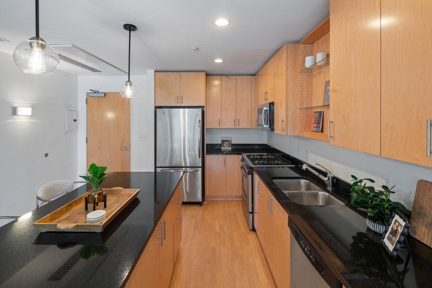 Wake up to beautiful sunrises in this bright, East-facing condo - photo 6