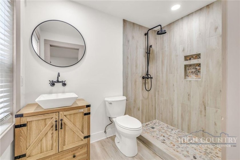 Welcome to this charming 2-bedroom, 2-bath Storybook Cottage - photo 21
