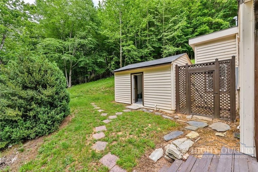 Welcome to this charming 2-bedroom, 2-bath Storybook Cottage - photo 27