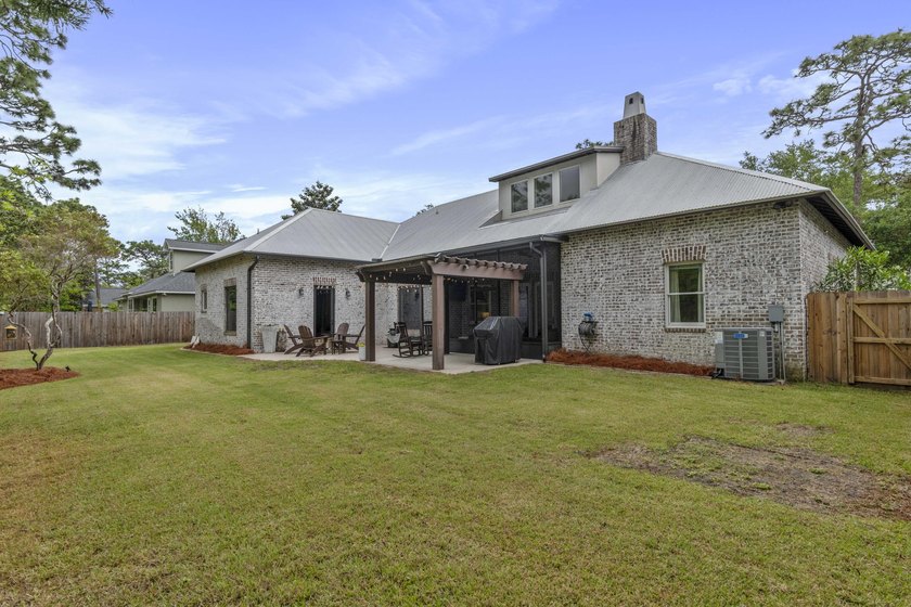 Tucked within the exclusive, gated waterfront community of - photo 8