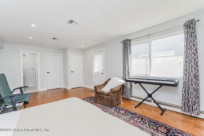 Welcome to this beautifully maintained semi-attached home in the - photo 3