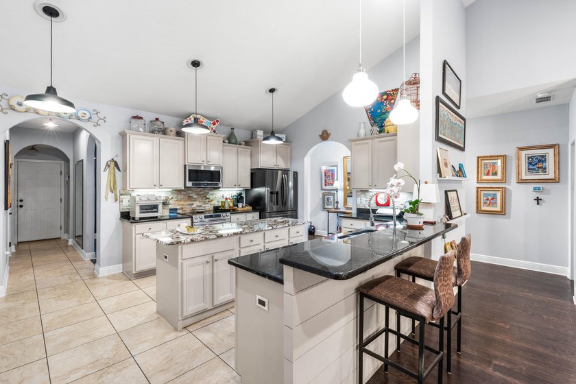 OWNED BY A CONTRACTOR WHO ADDED MANY UPGRADES. SINGLE LEVEL - photo 6