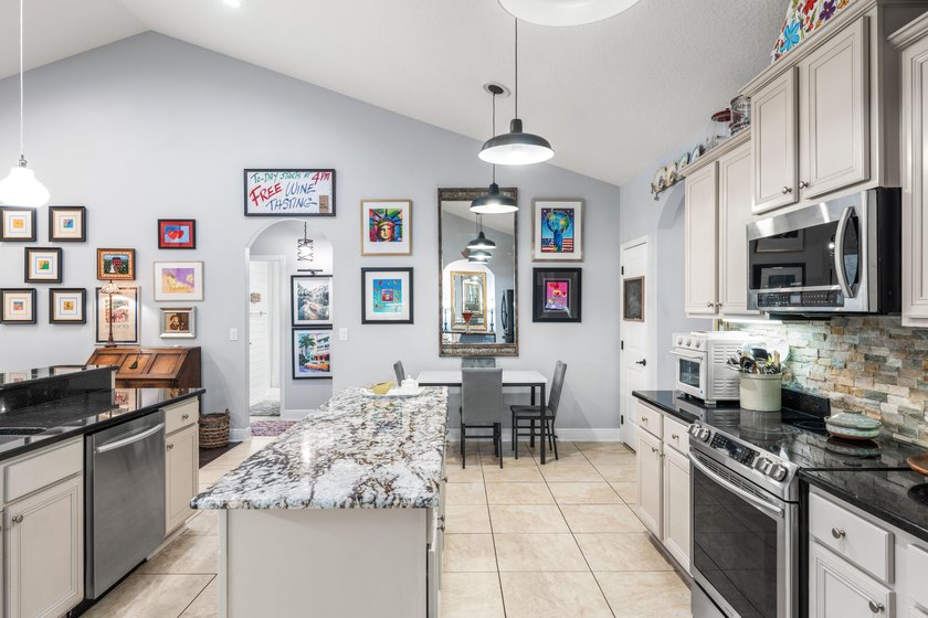 OWNED BY A CONTRACTOR WHO ADDED MANY UPGRADES. SINGLE LEVEL - photo 10