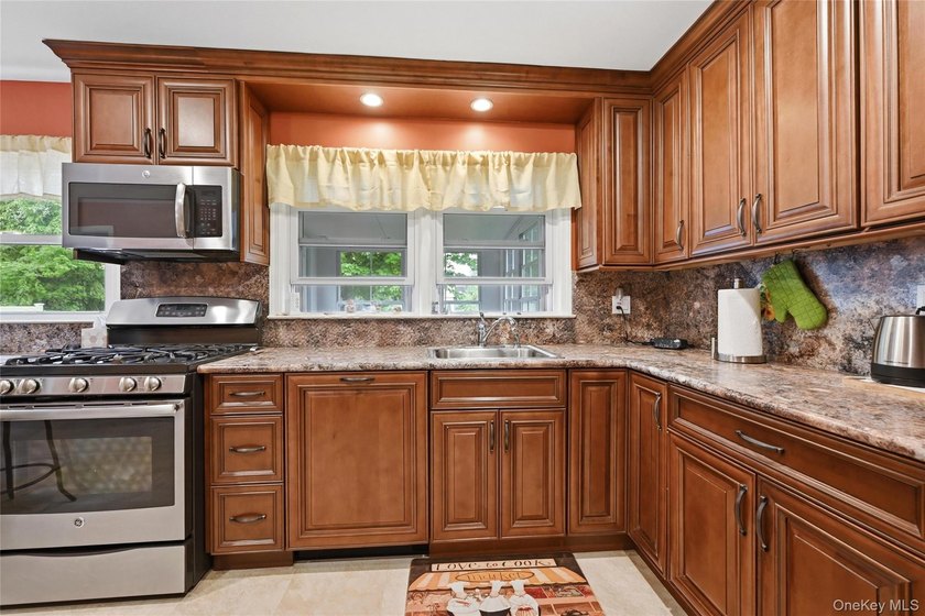 AVAILABLE.........Updated, spacious and move in ready! Boasting - photo 14