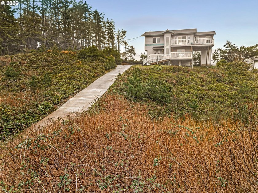 Experience breathtaking ocean views from both levels. Furnished - photo 8