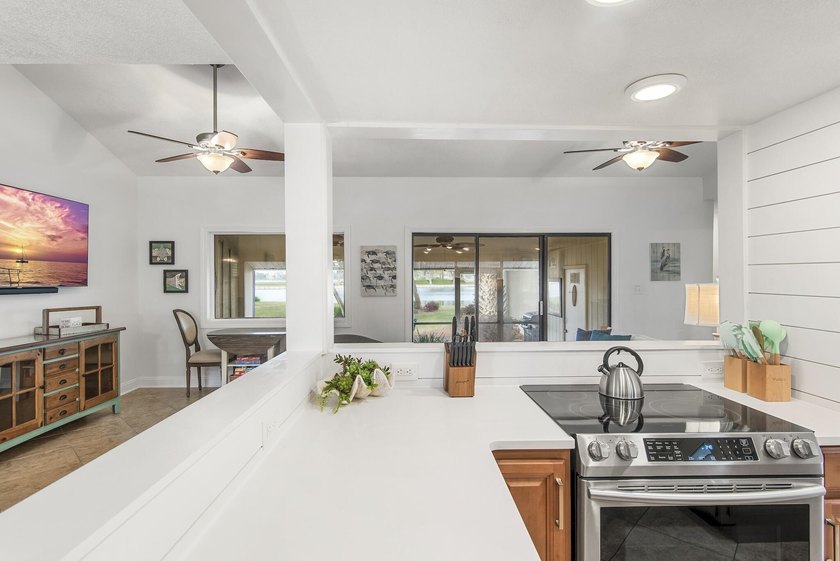 Enjoy stunning panoramic views of the lake, golf course, and - photo 8