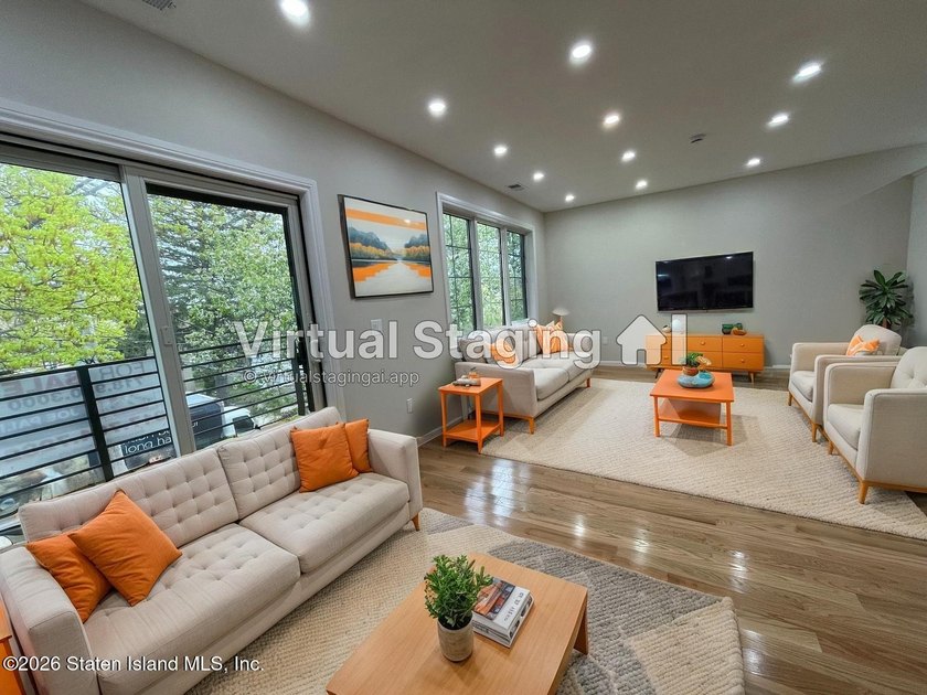 *New Construction* Stunning Two Family detached house with 9ft - photo 3