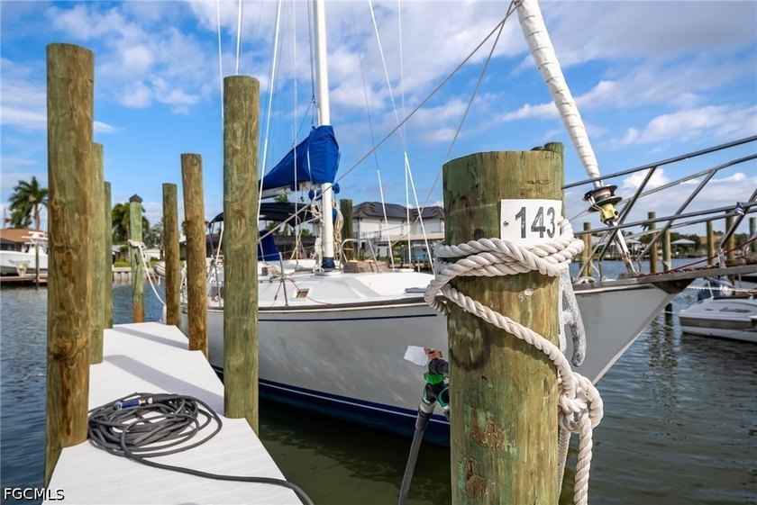 Large Dock and Covered Parking Space are includede by Boat, Come - photo 34