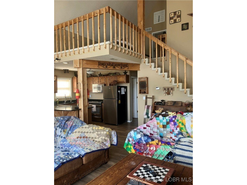 > A wall of windows and vaulted ceilings. Main level living! Big - photo 13