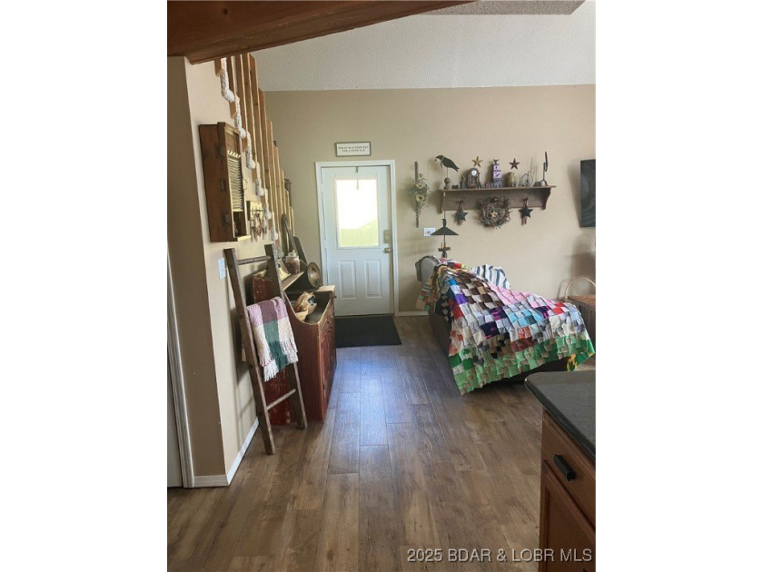 > A wall of windows and vaulted ceilings. Main level living! Big - photo 14