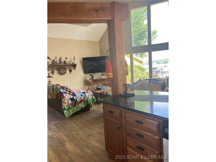 > A wall of windows and vaulted ceilings. Main level living! Big - photo 15