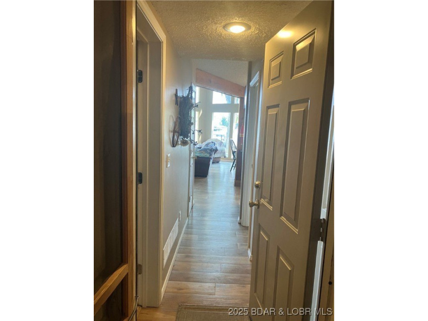 > A wall of windows and vaulted ceilings. Main level living! Big - photo 17