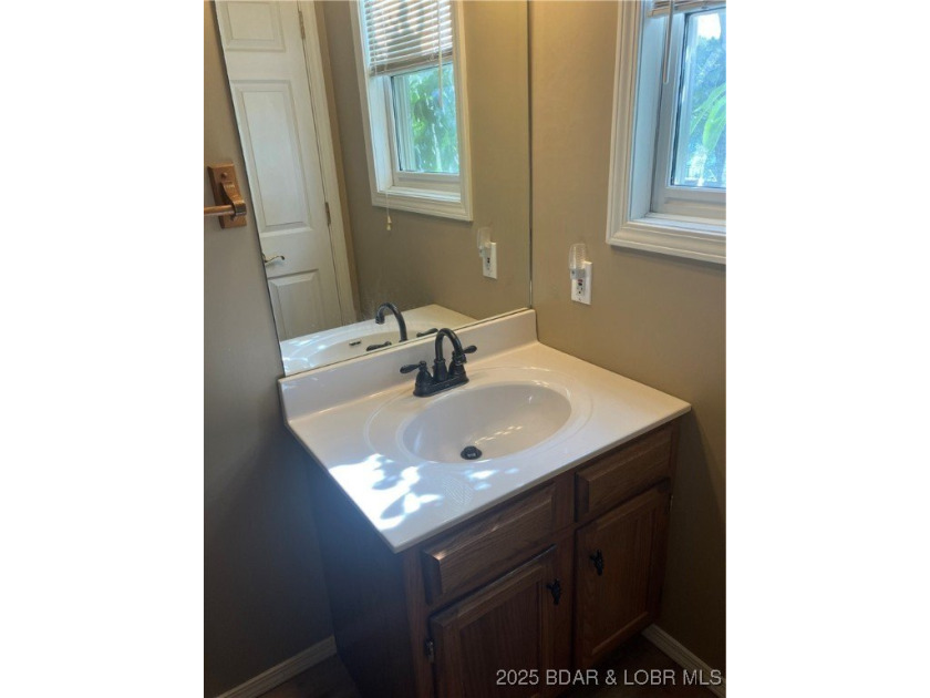 > A wall of windows and vaulted ceilings. Main level living! Big - photo 23