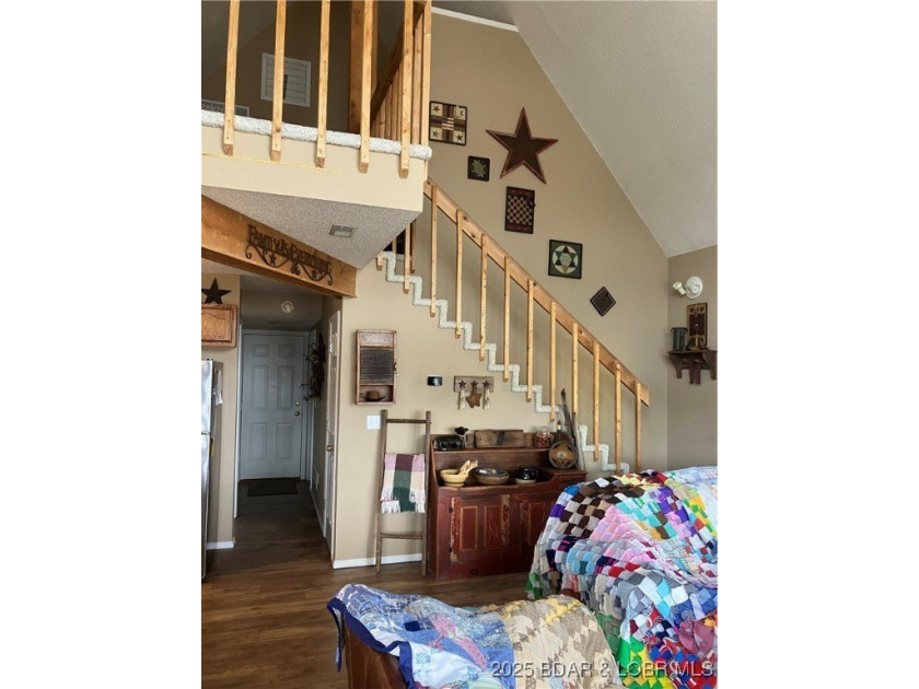 > A wall of windows and vaulted ceilings. Main level living! Big - photo 28